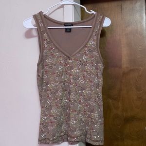 Summer shirt but does have two or three little small holes